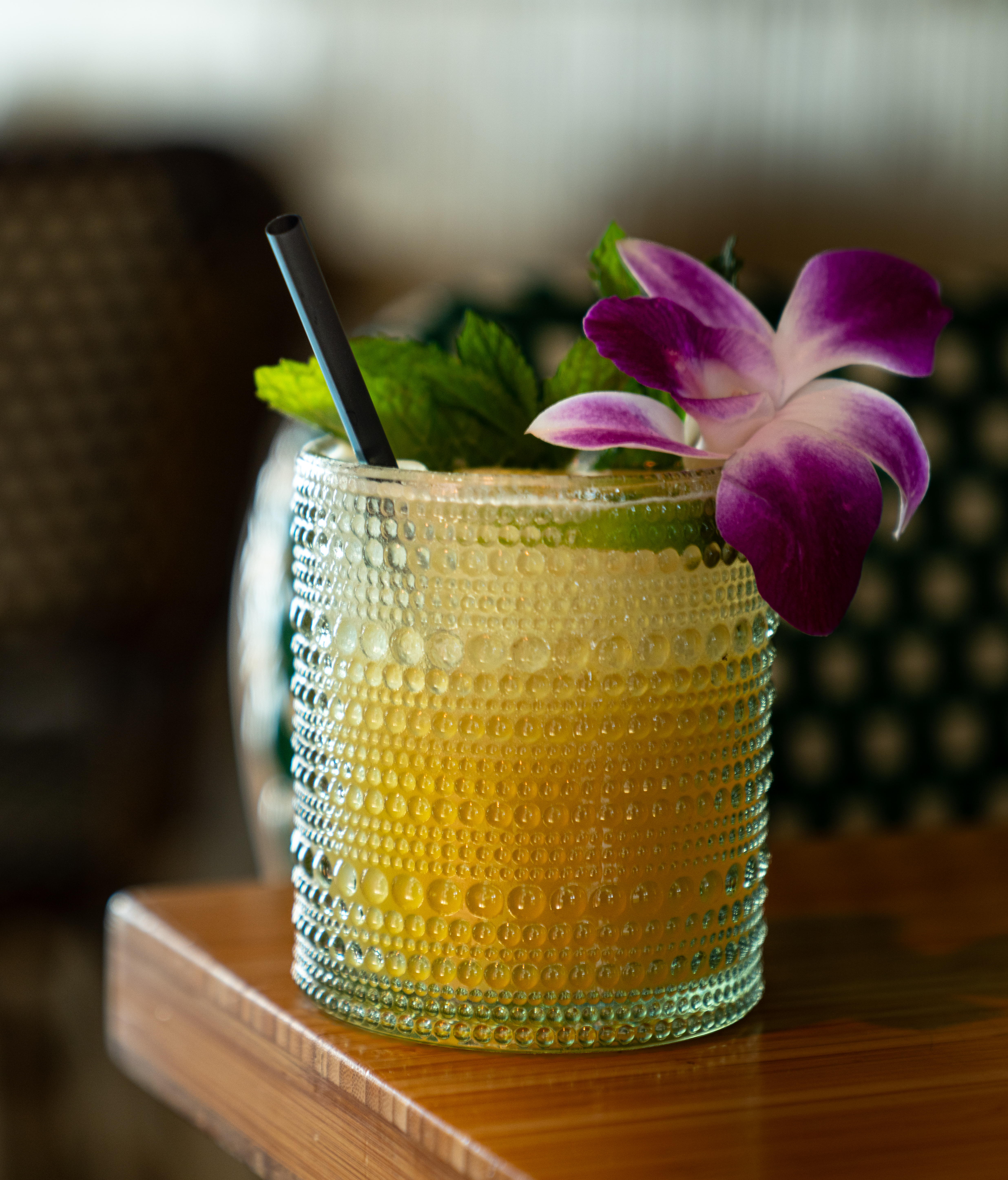 a vase filled with flowers sitting on a table