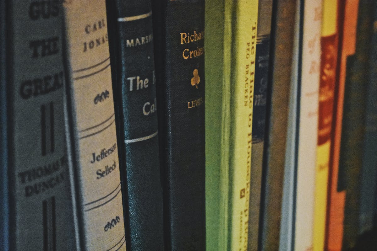 a book sitting on top of a bookshelf