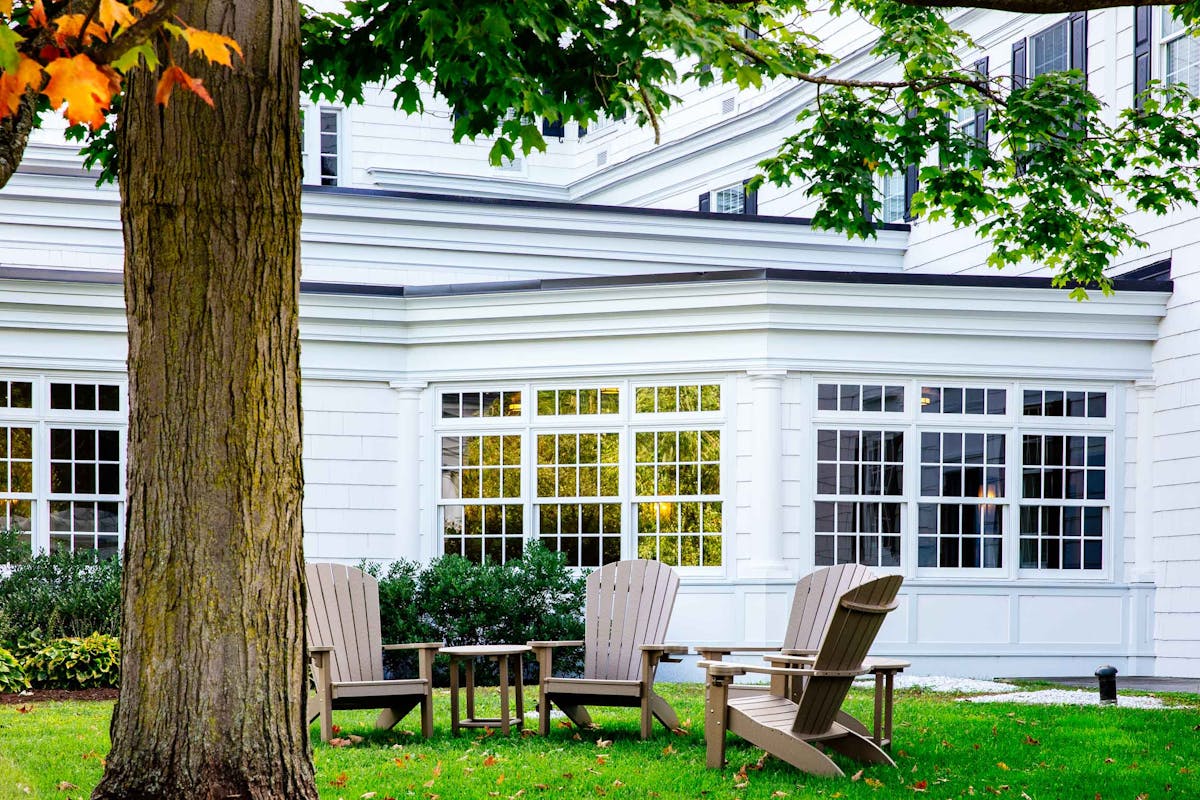 a bench in front of a house