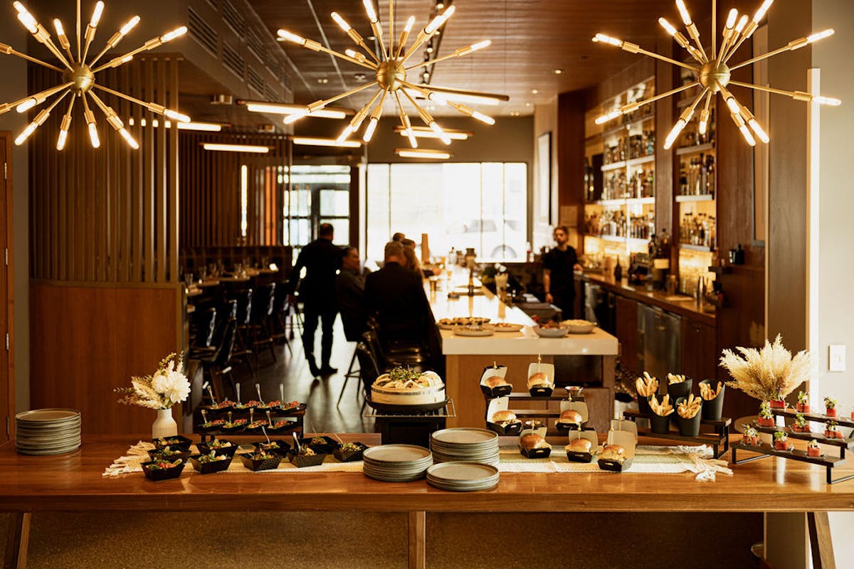 A room with people walking