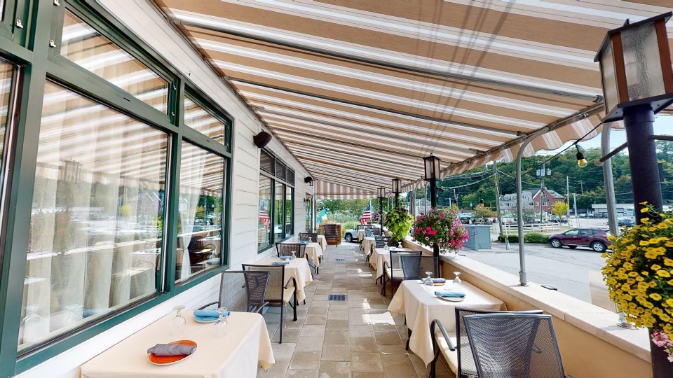 a room filled with furniture and a large window