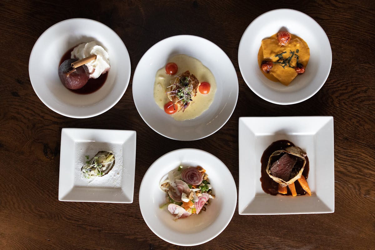 a bowl filled with different types of food on a plate