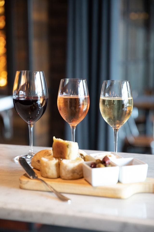 a close up of a glass of wine