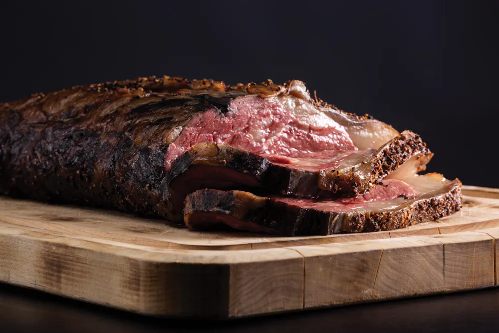 a piece of meat on a cutting board