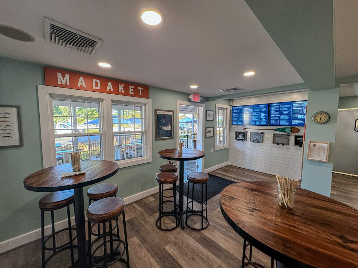 a kitchen with a dining room table