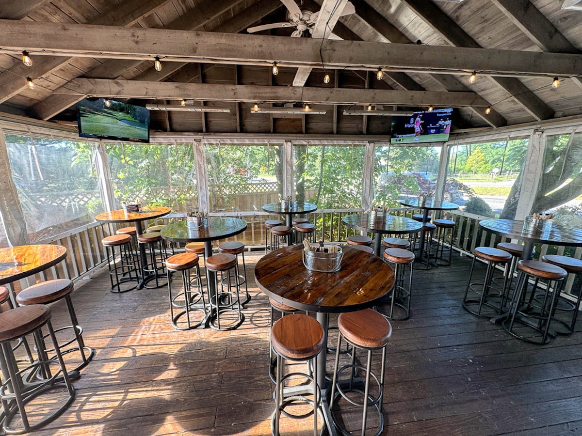a dining room table in front of a building