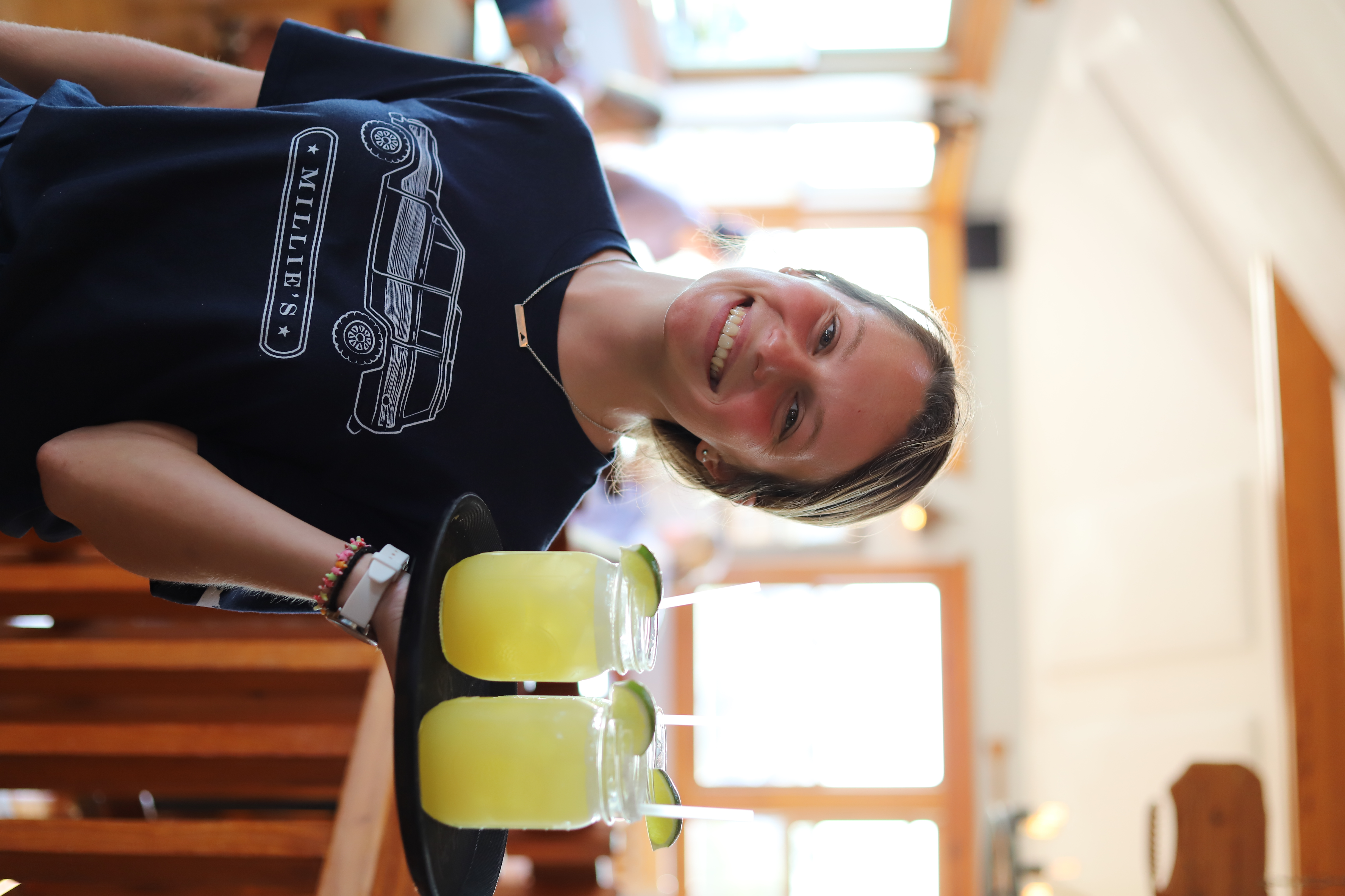 a person holding a glass of wine