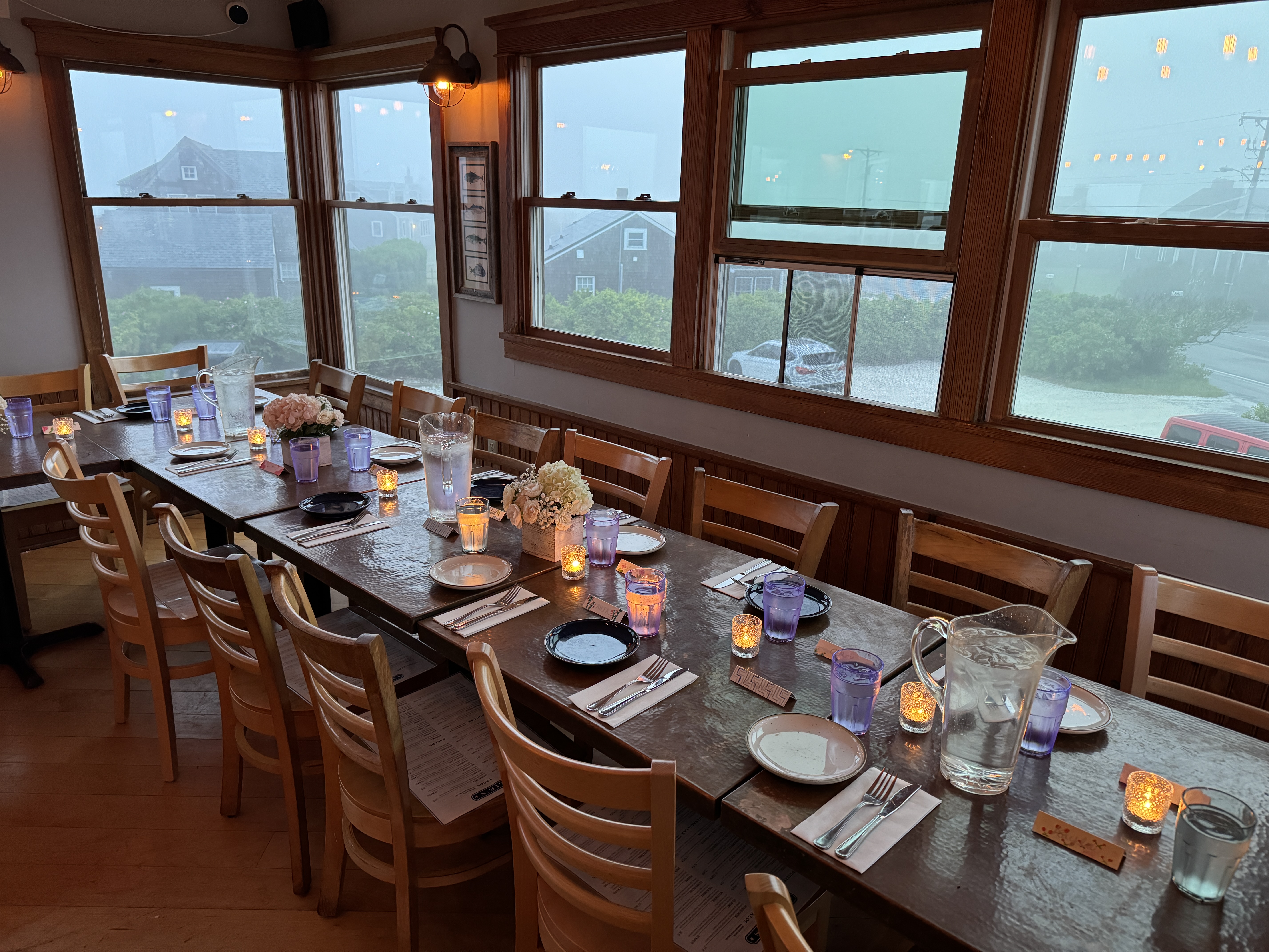 a sitting table with so many dishes
