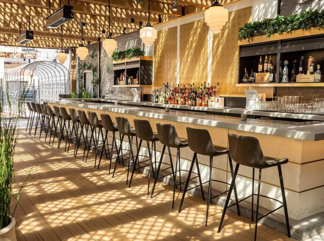 a dining room table in front of a building