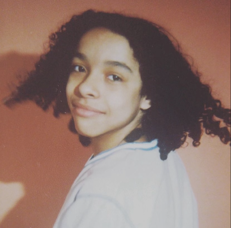 a woman looking at the camera