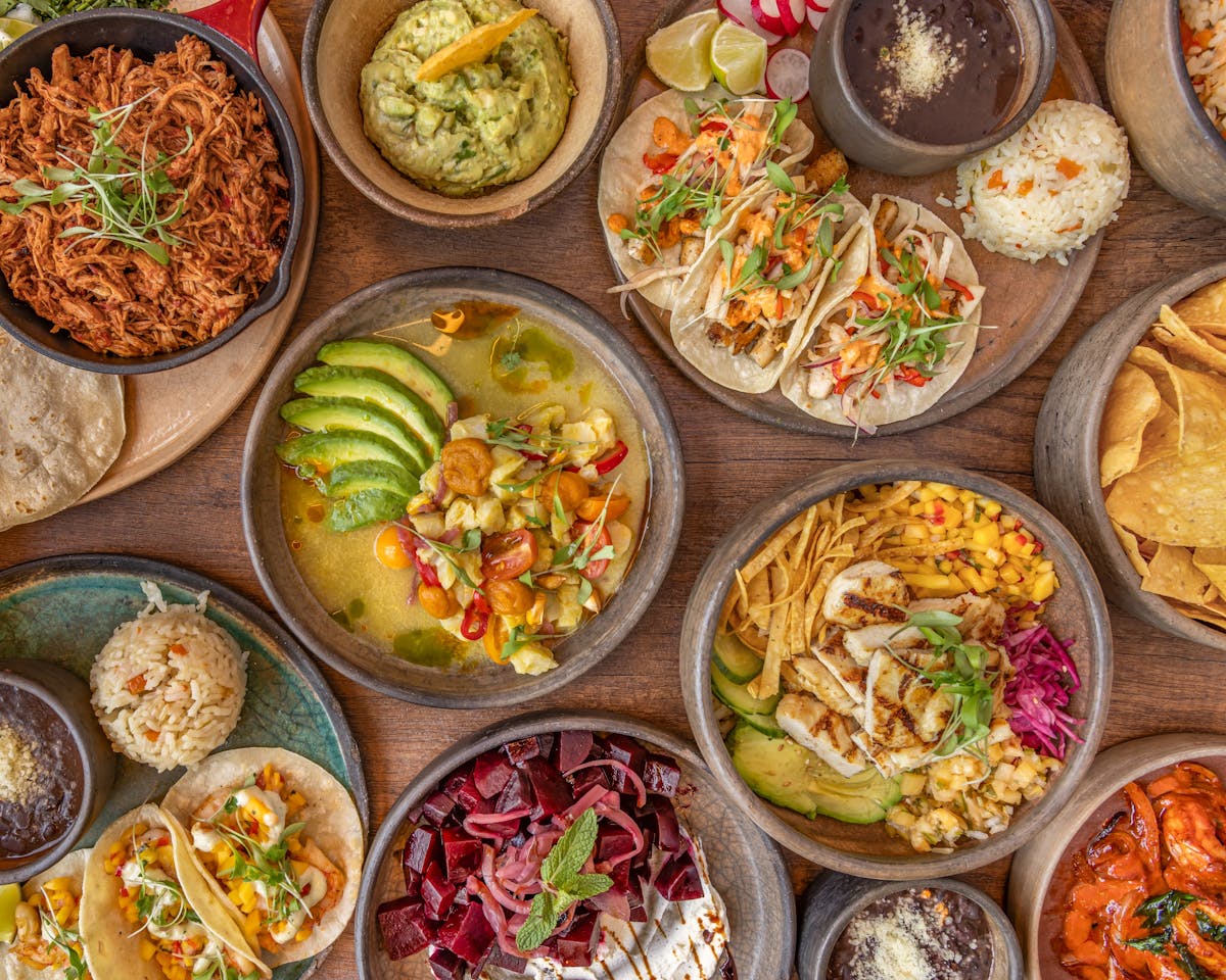 many different types of food on a wooden table