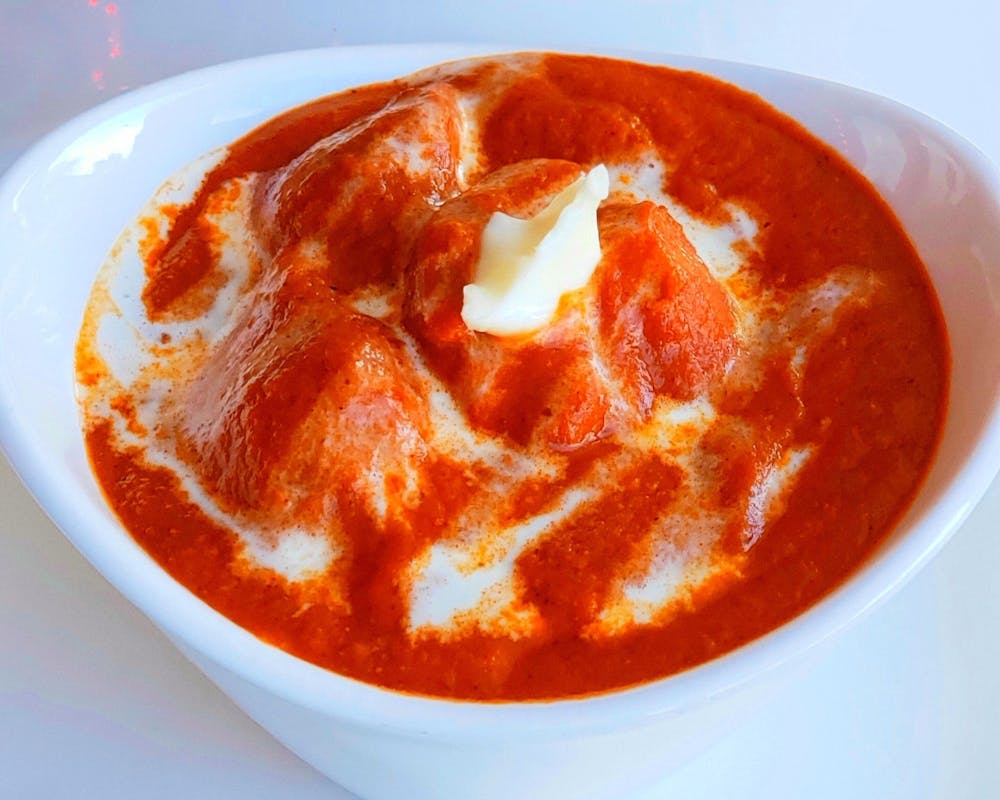 a close up of a bowl of food on a plate