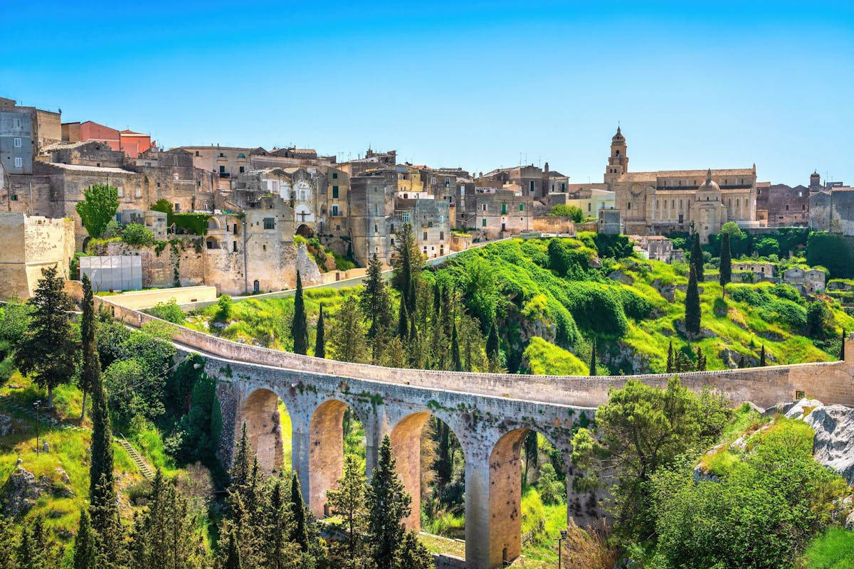 a bridge over a river in a city