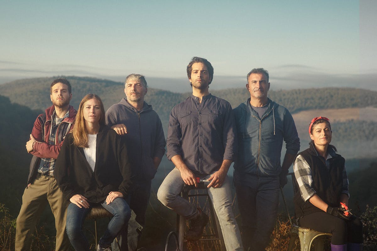 a group of people posing for the camera