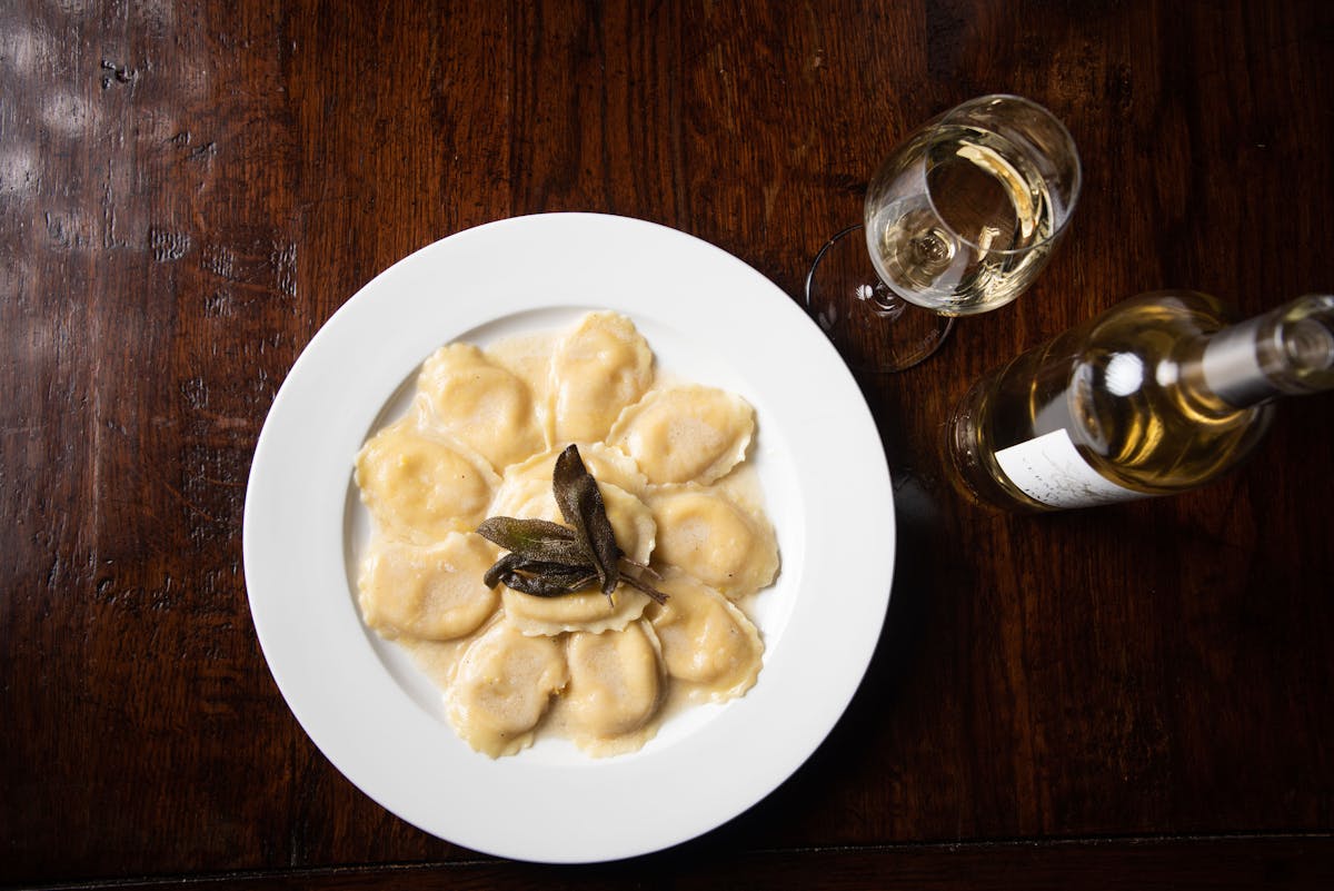 a plate of food on a wooden table