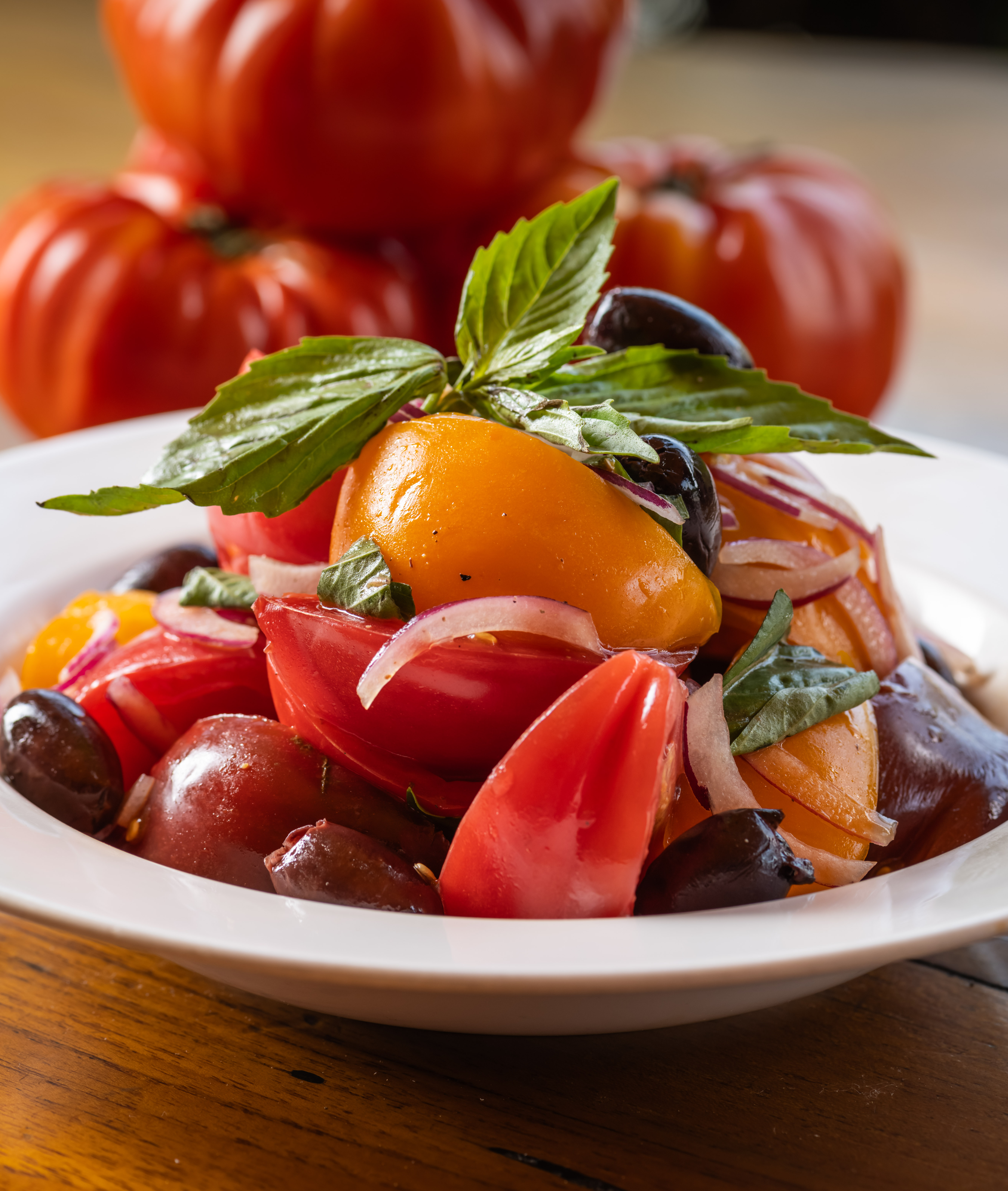 a bowl of fruit on a plate