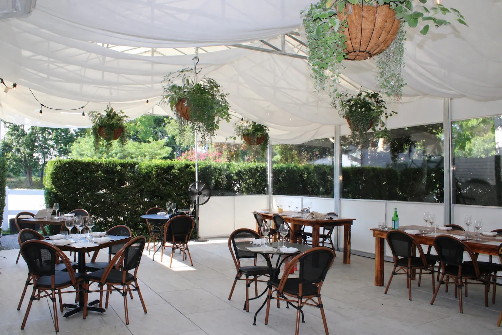 The East Patio under its canopy and hanging baskets