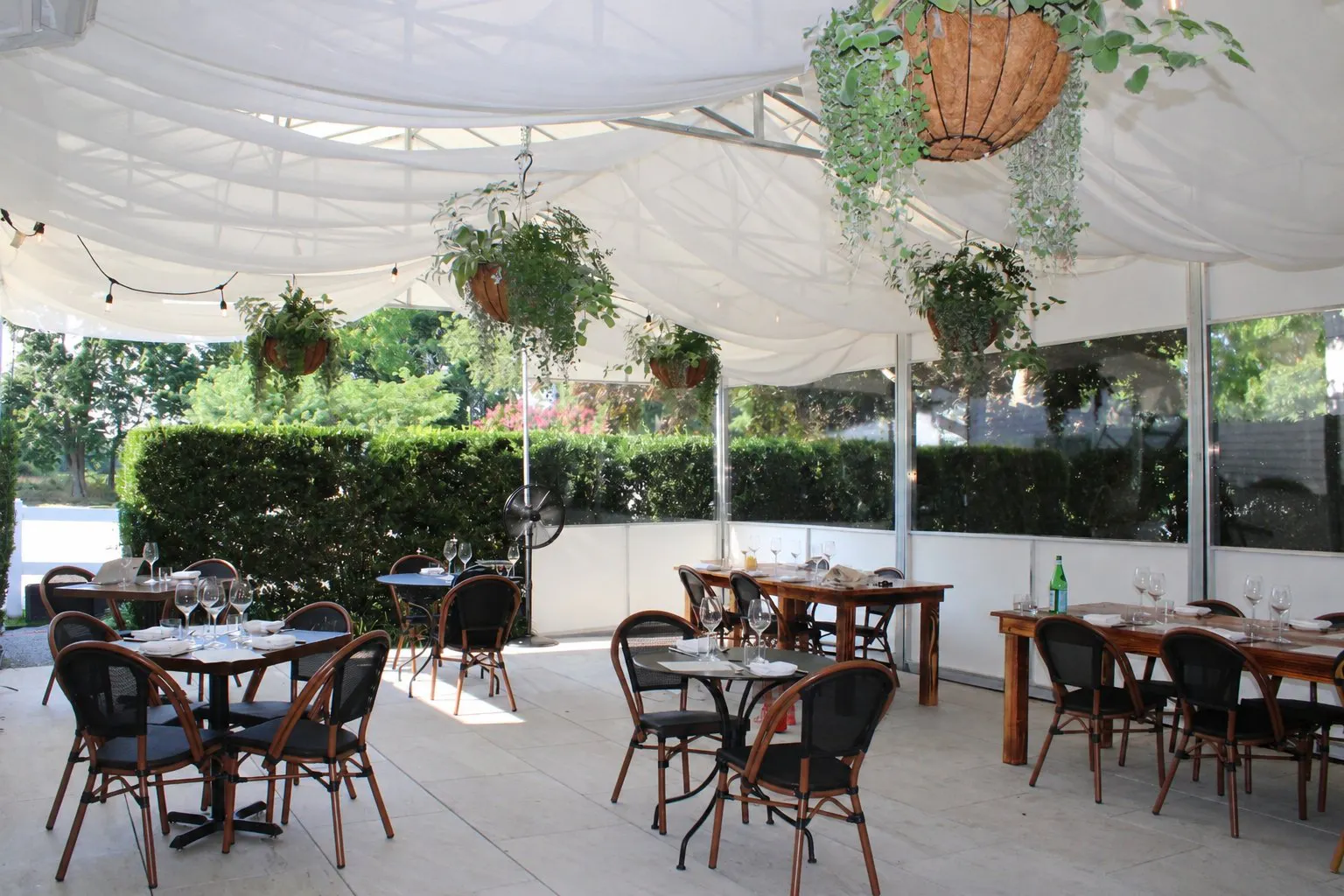 The East Patio under its canopy and hanging baskets