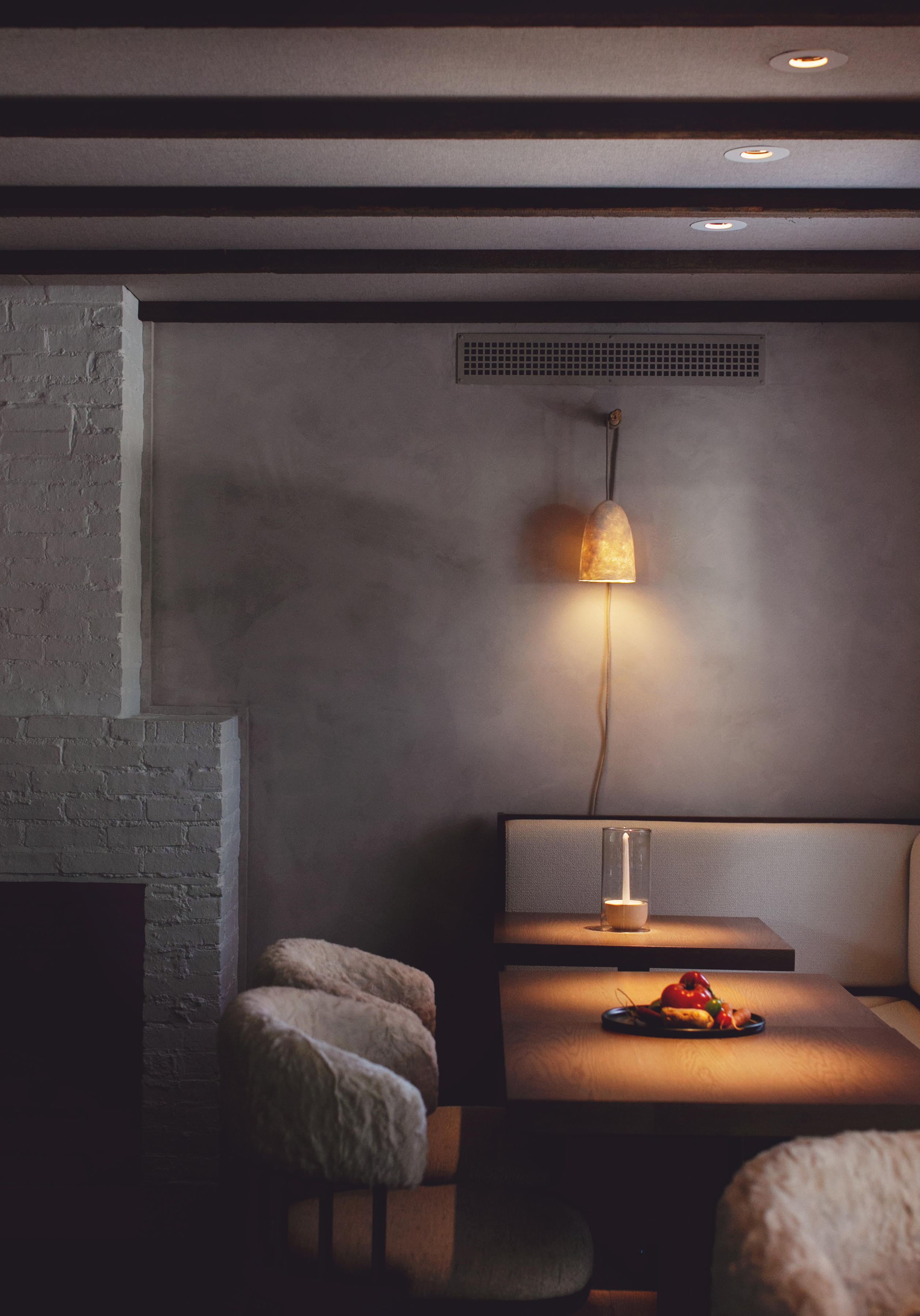 a bedroom with a bed and a mirror