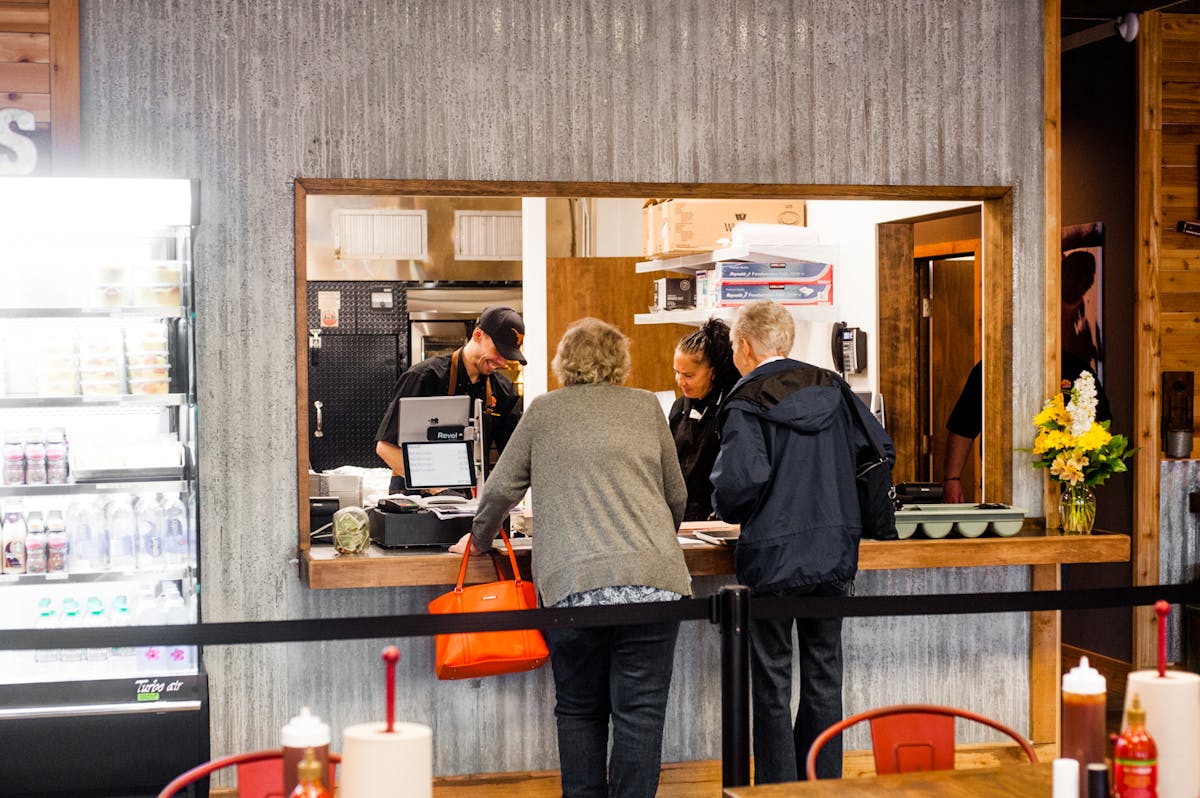 people at the restaurant counter