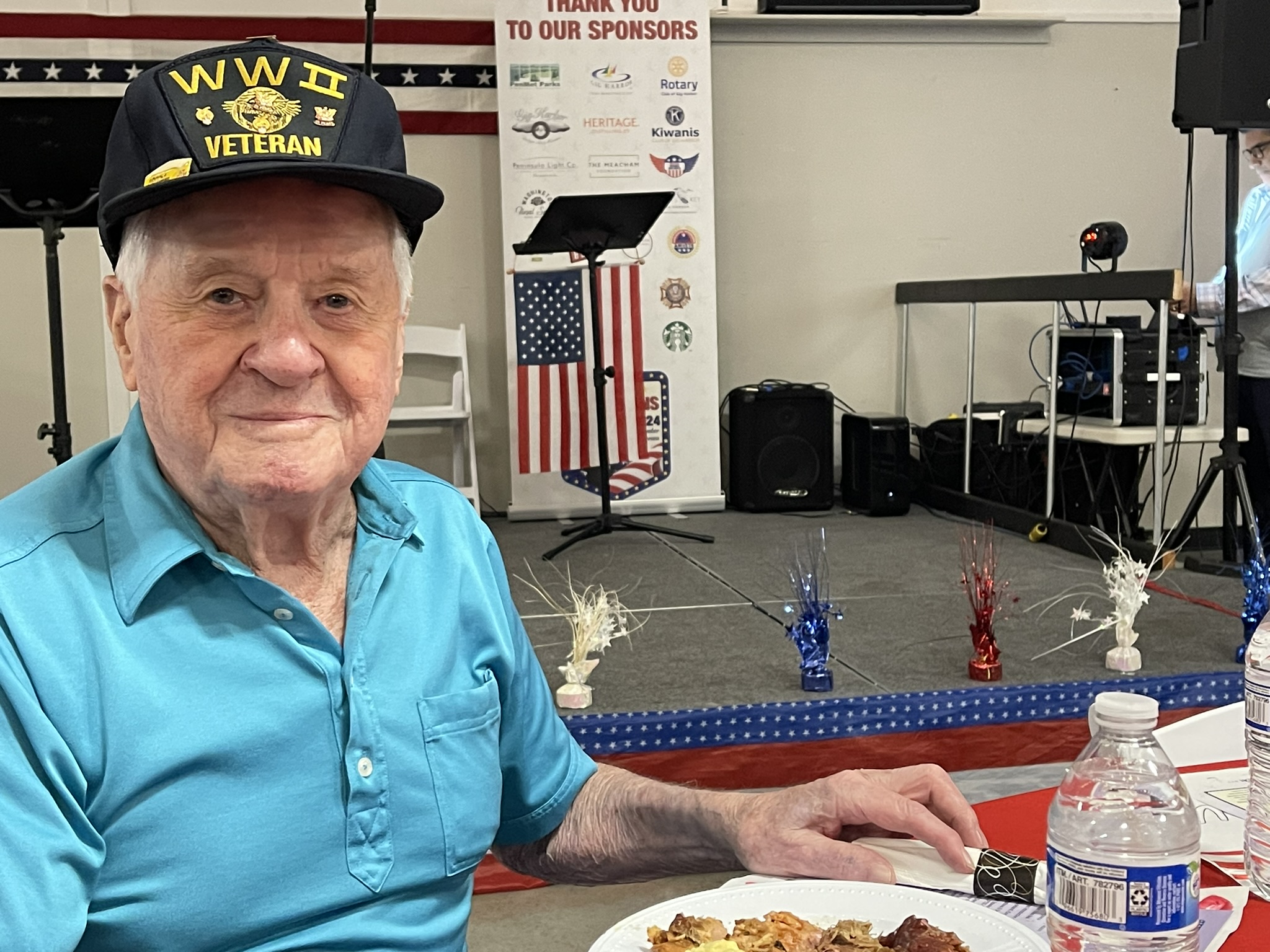 a man holding a hot dog