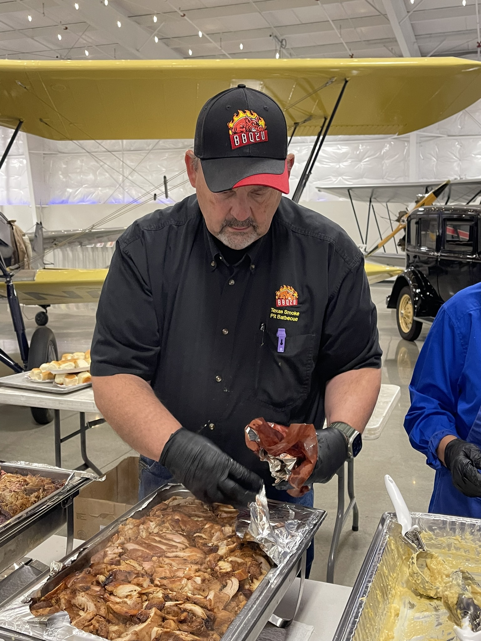 a man preparing food inside of it