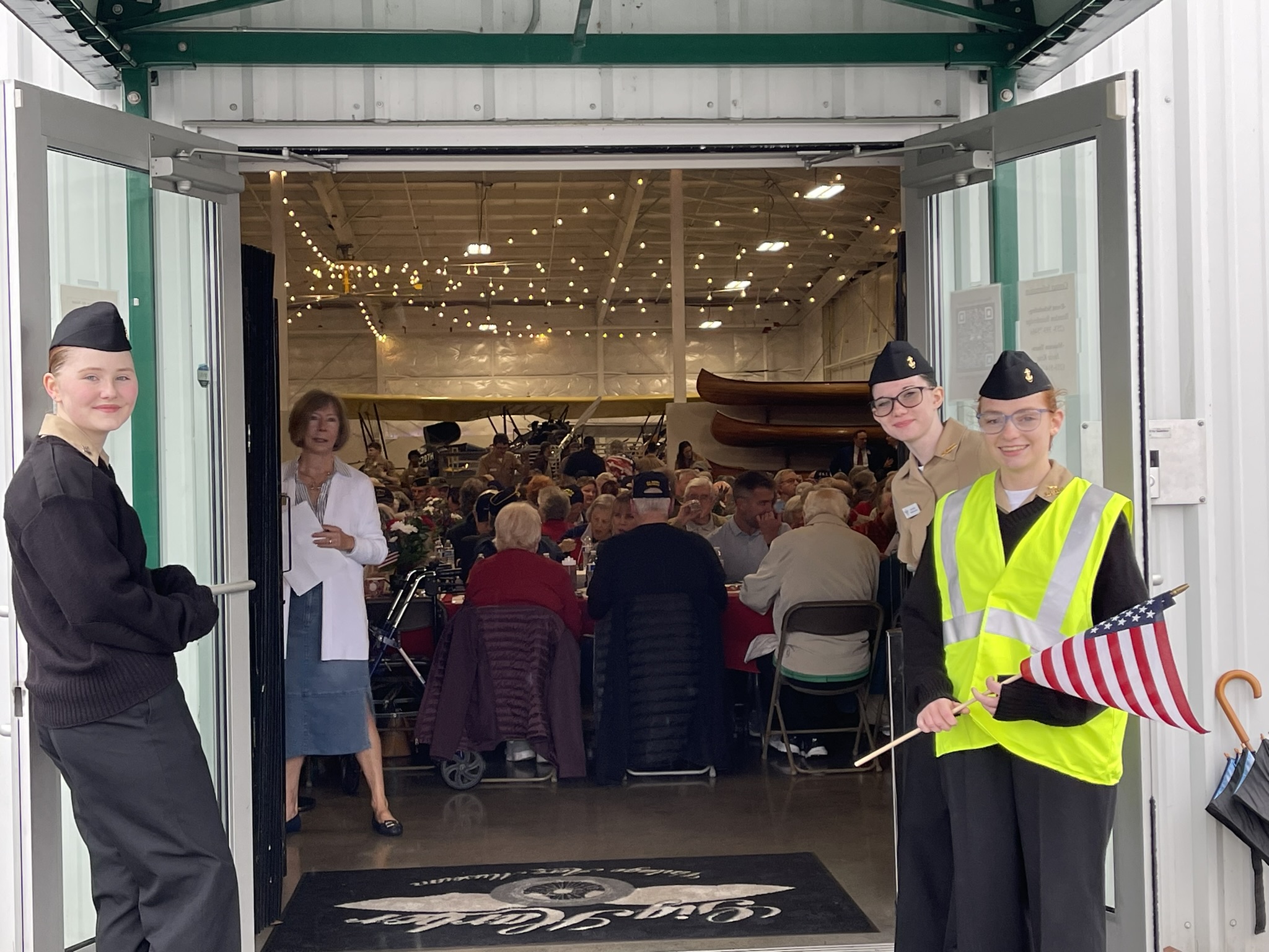 a group of people standing in front of a building