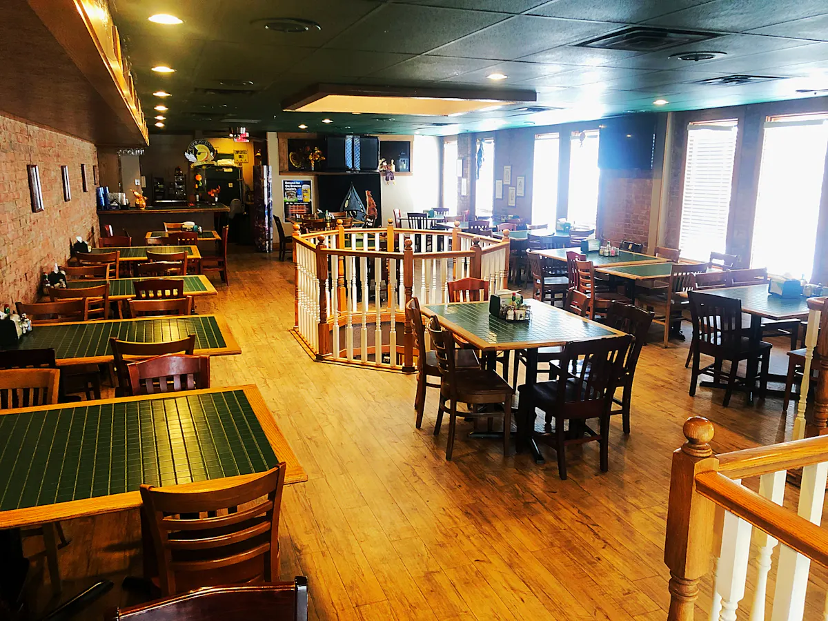 a large room filled with tables and chairs