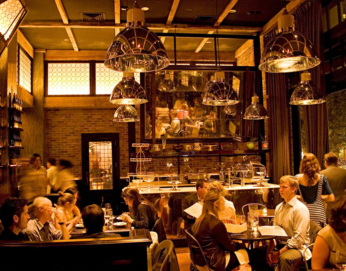 a dining room filled with people having dinner