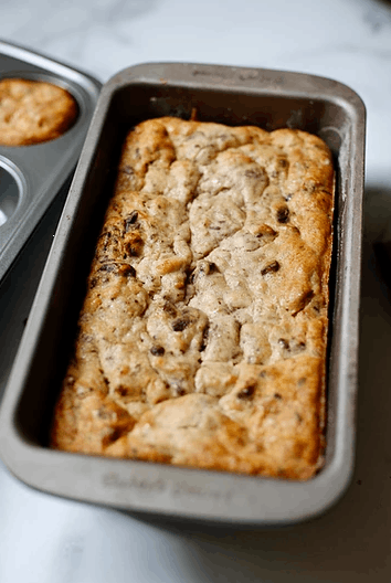 a pan with chocolate chip banana bread in it