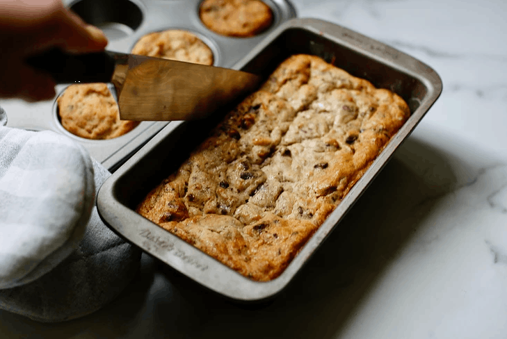 banana bread being cut