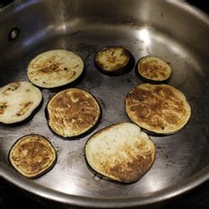 food cooking in a pan on a stove