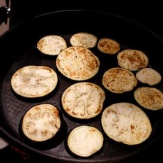 a close up of food on a grill