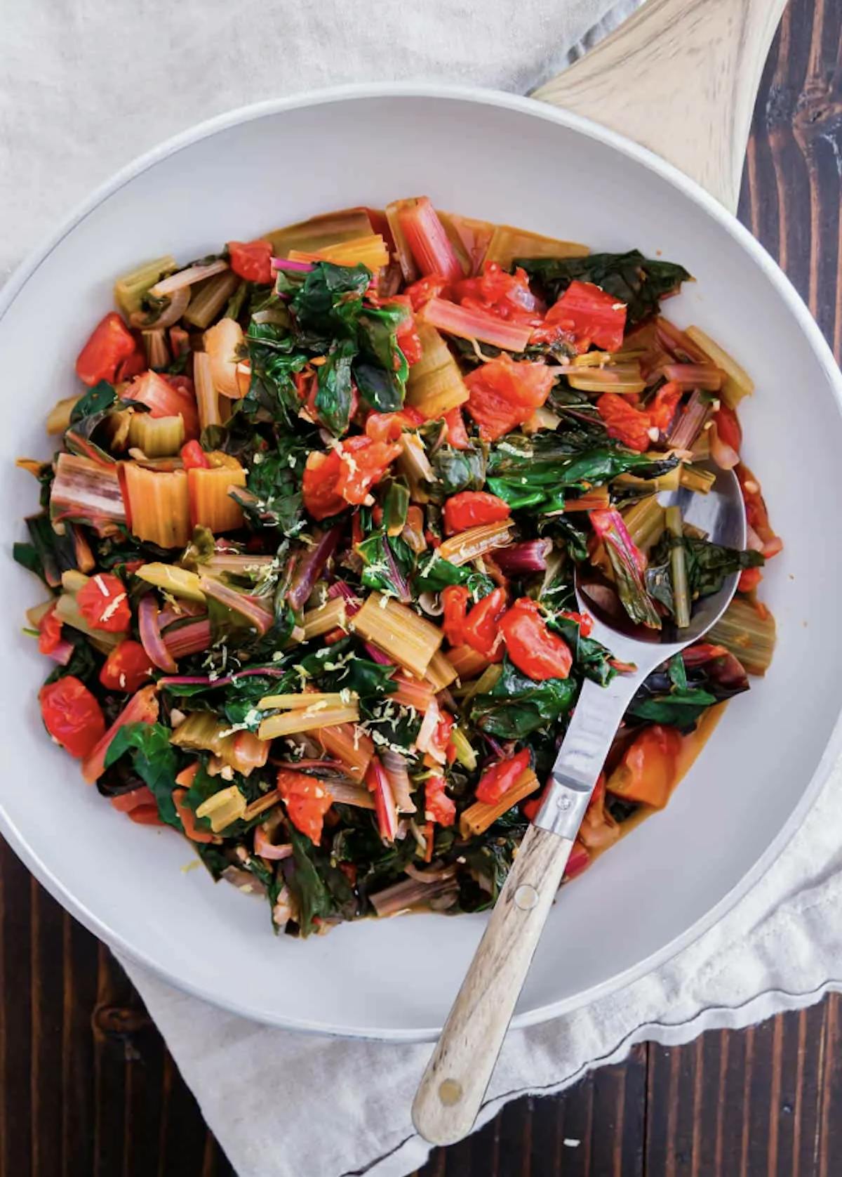 a bowl of salad on a plate