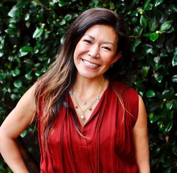 a person smiling for the camera