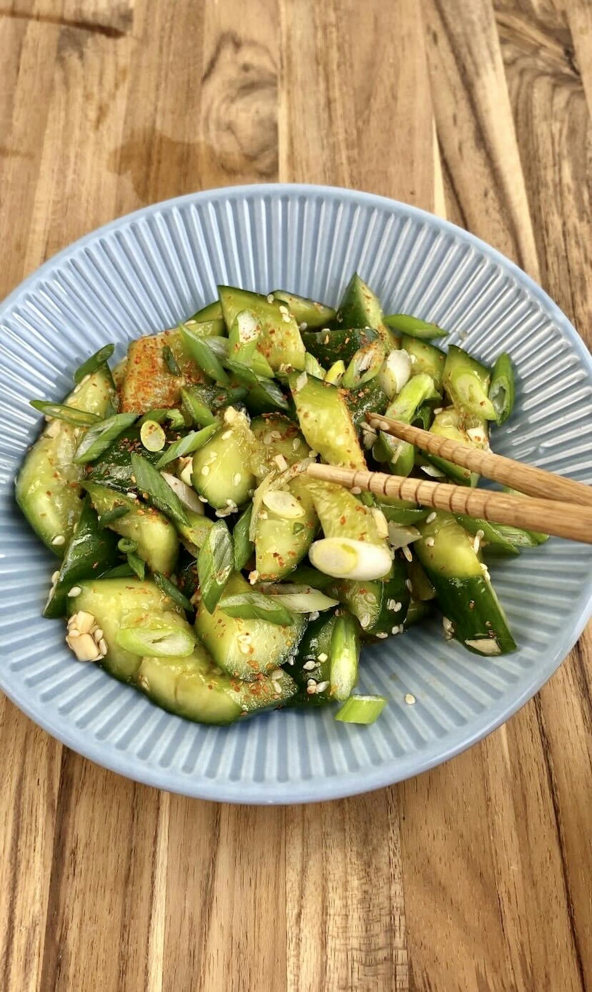 a plate of food on a wooden table