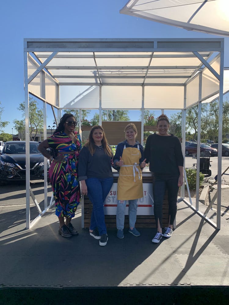 Alex Guarnaschelli and the judges of Super Market Stakeout standing with Chef Anja Lee