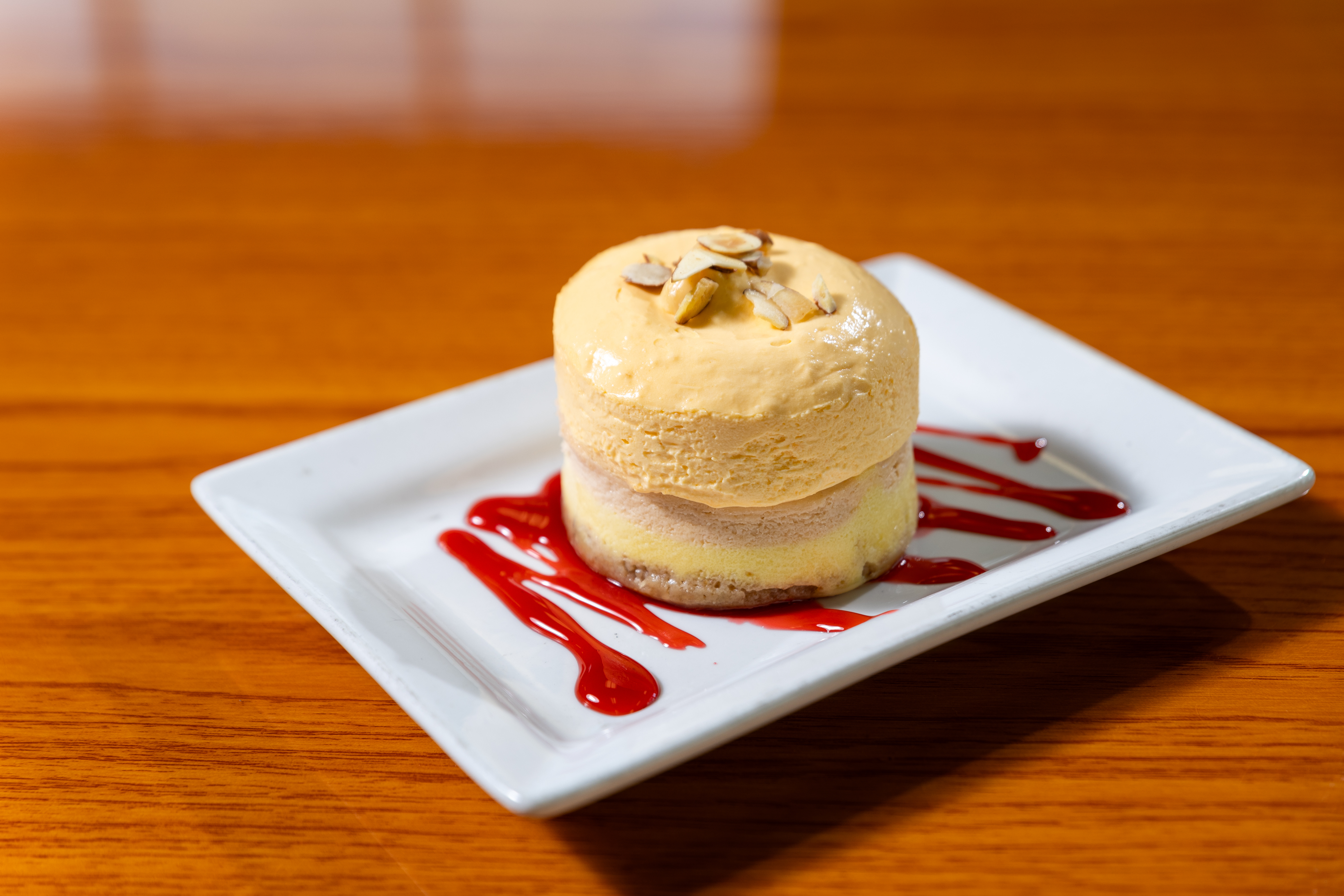 a piece of cake sitting on top of a wooden table