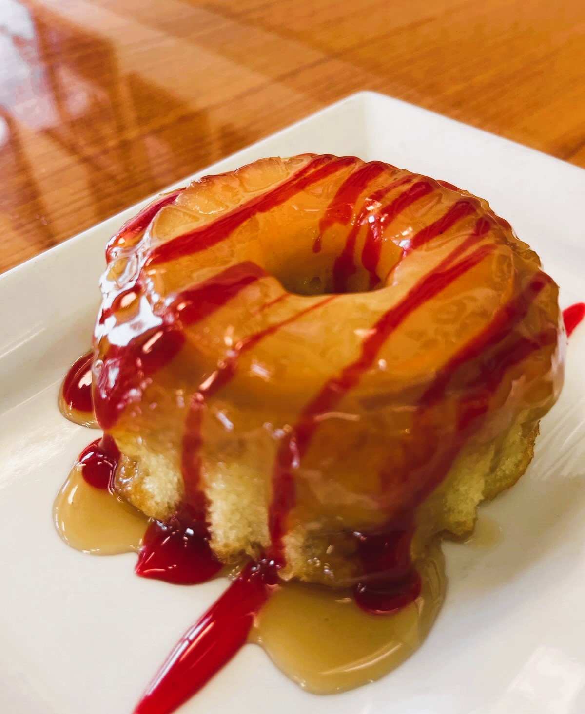 a doughnut sitting on top of a paper plate