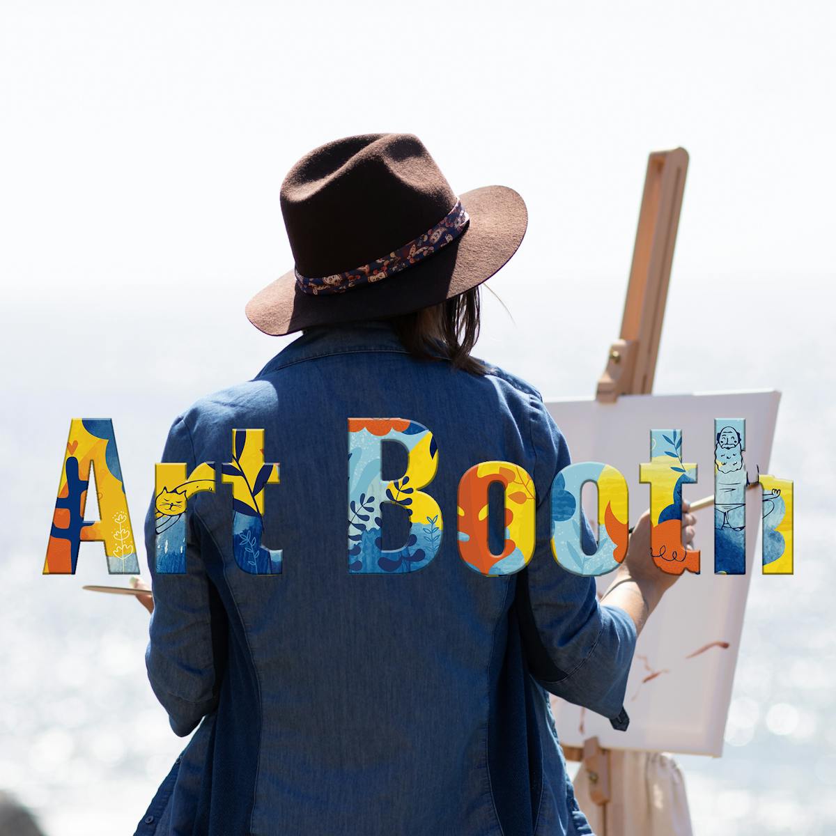 Artist painting in front of the ocean. Her back turned towards us.