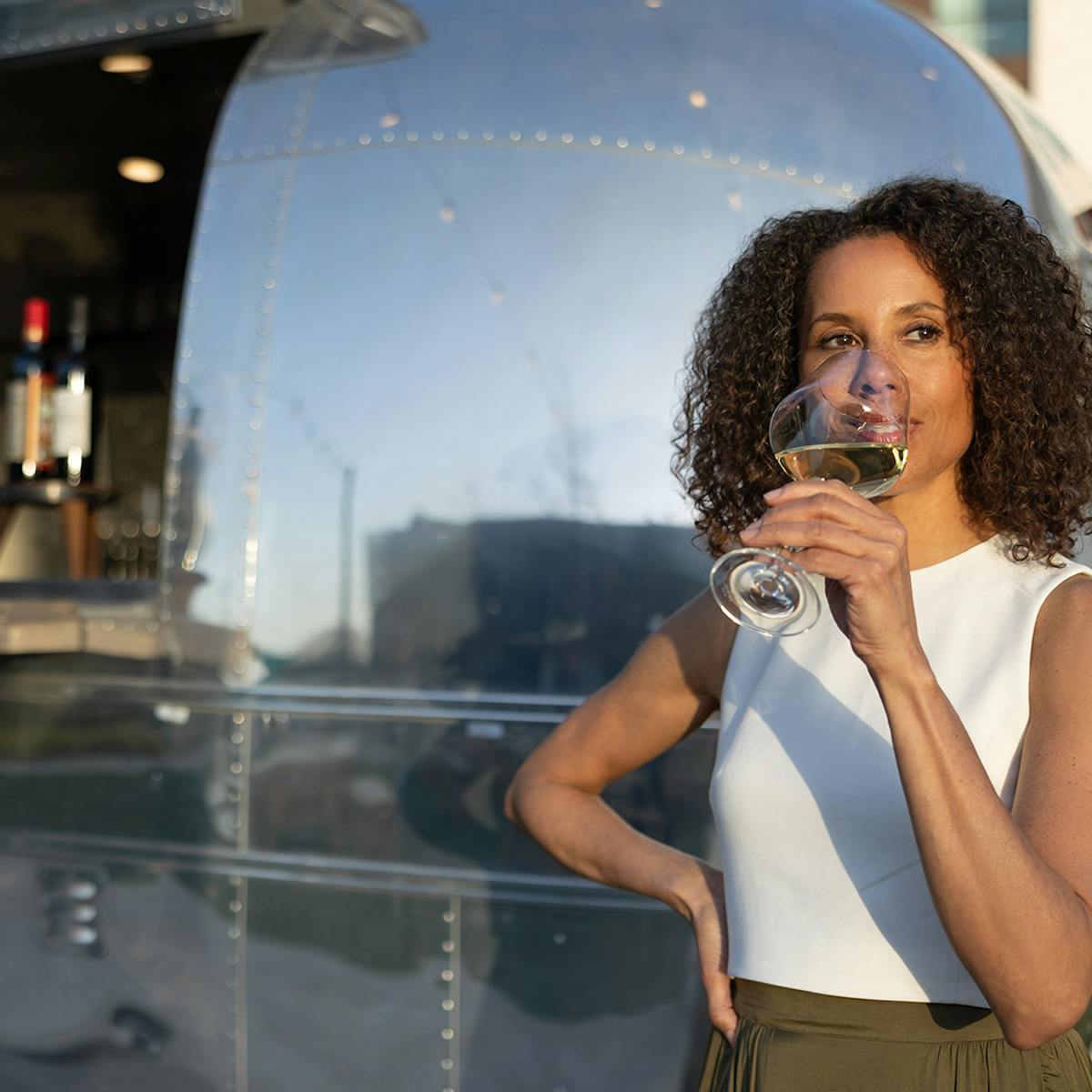 lady drinking a glass of wine