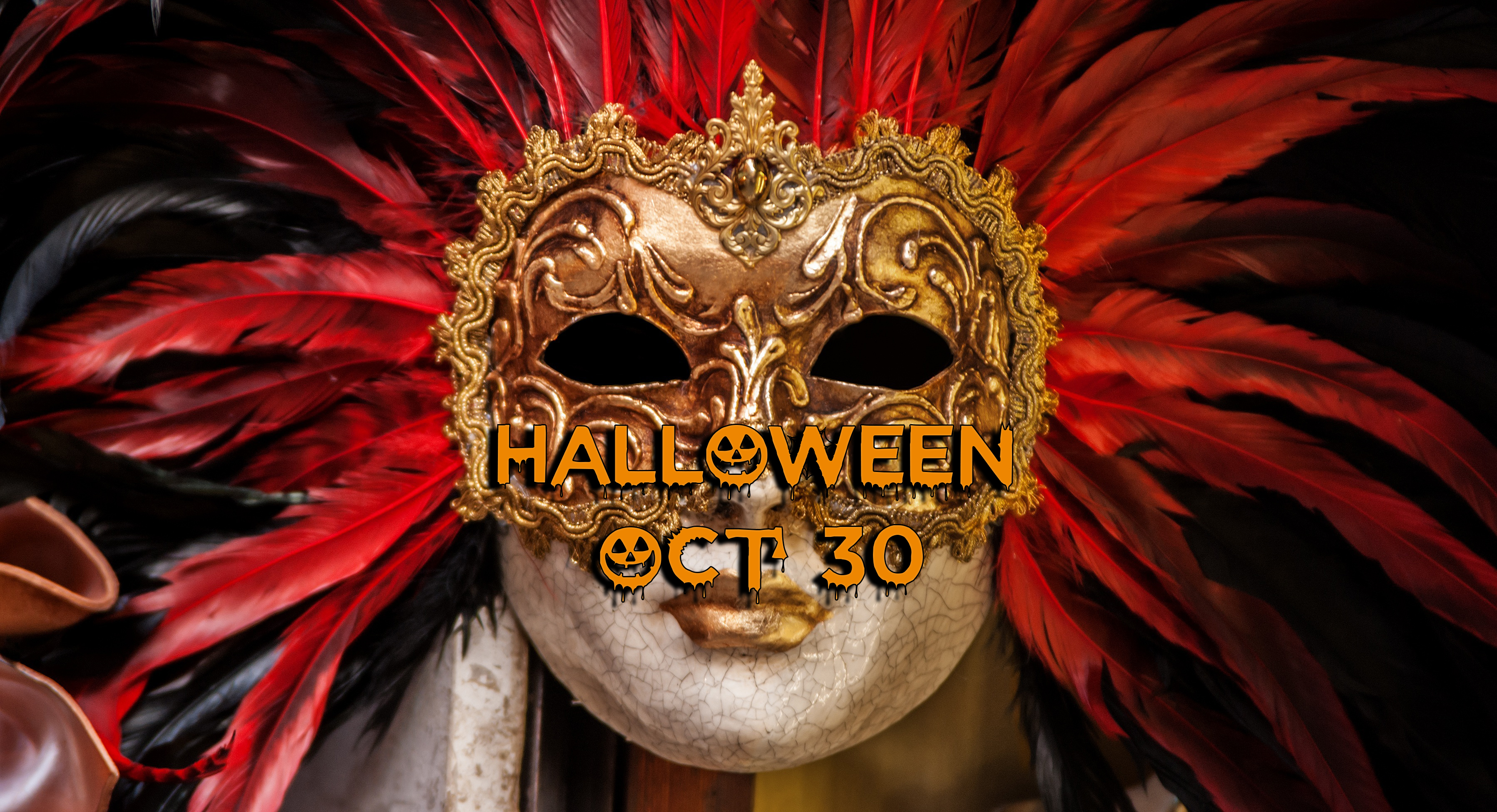 A gold venetian mask with red feathers staring at us. Title: Halloween Oct 30