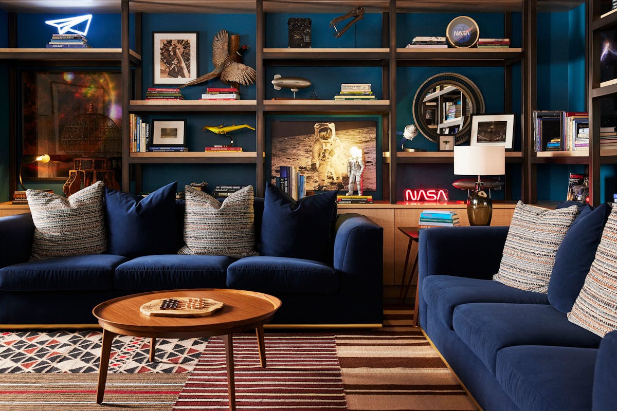 Small library room filled with aviation and space objects