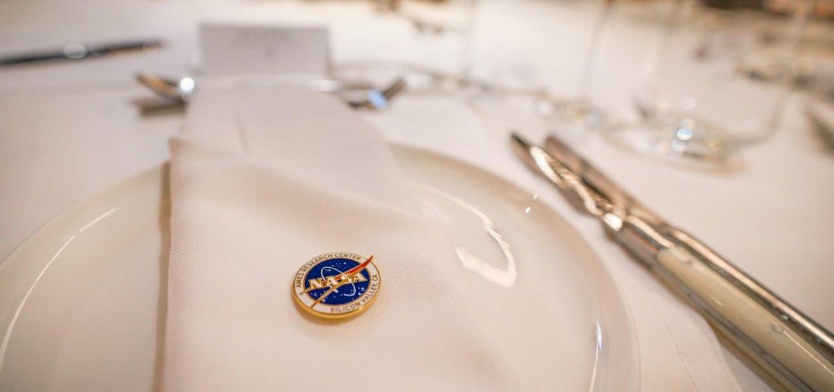 Table setup with NASA pin displayed in the middle
