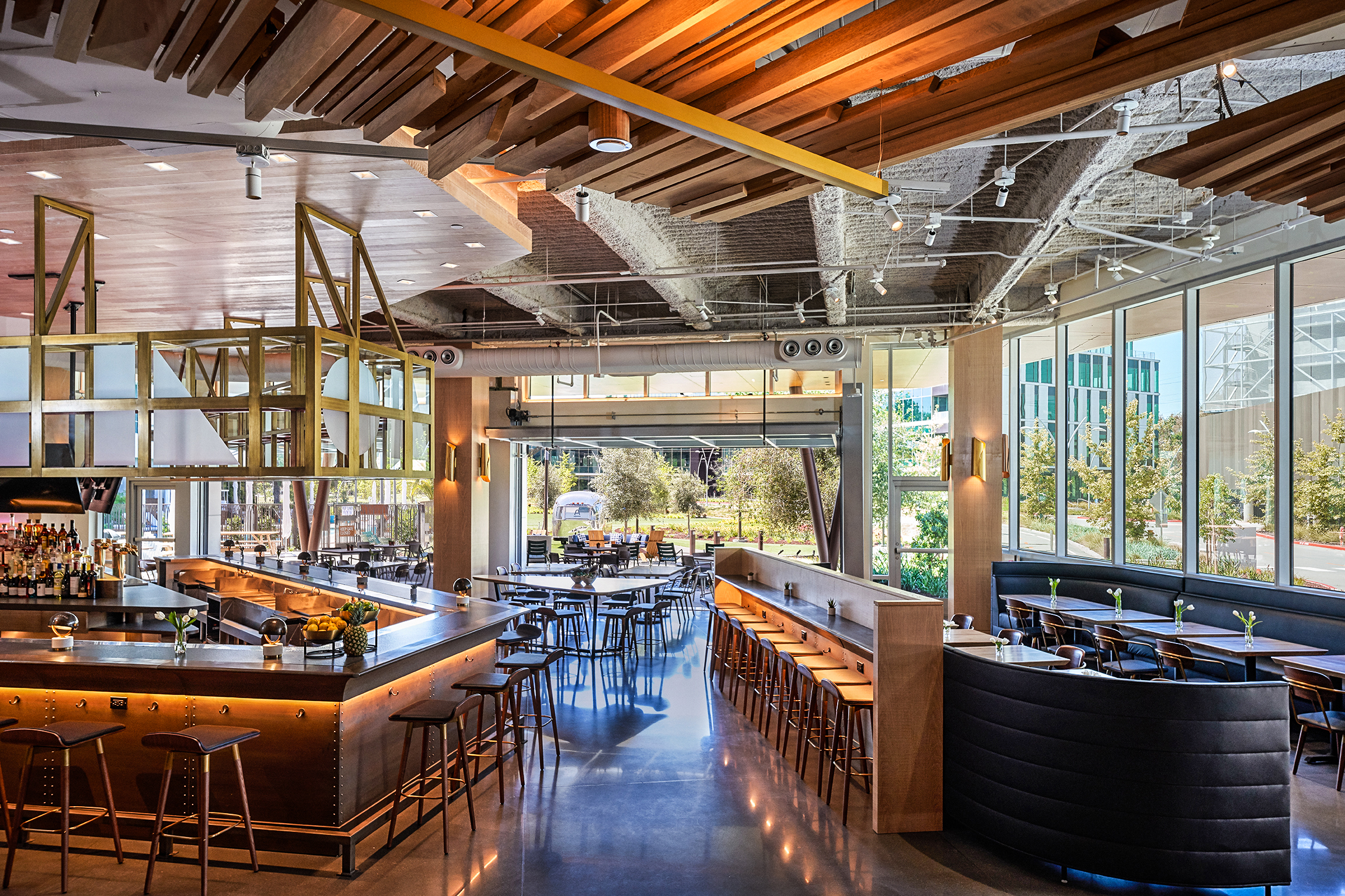 restaurant filled with furniture leading to patio