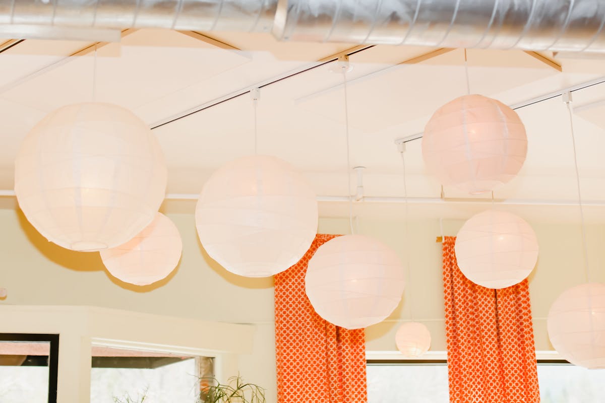 an orange hanging from the ceiling