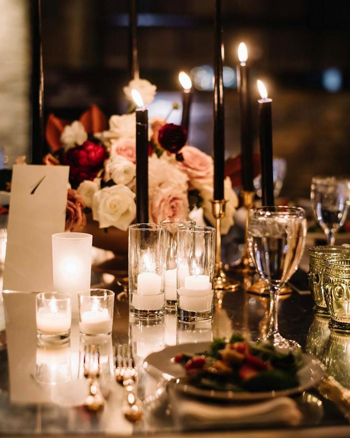 a table with wine glasses