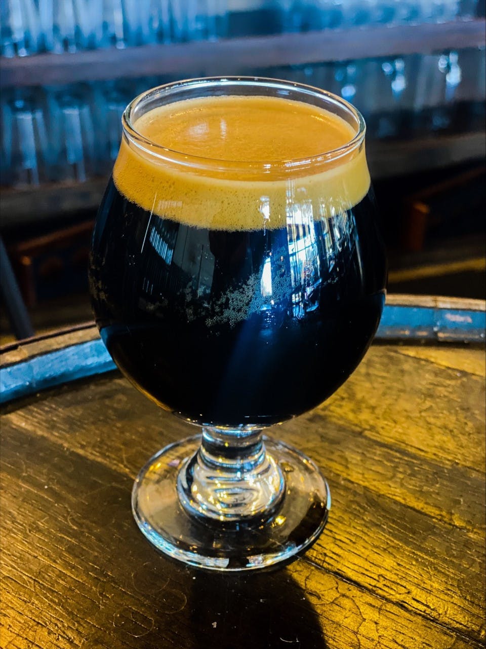 A glass of AquaBrew's Swift River Pecan Praline Baltic Porter