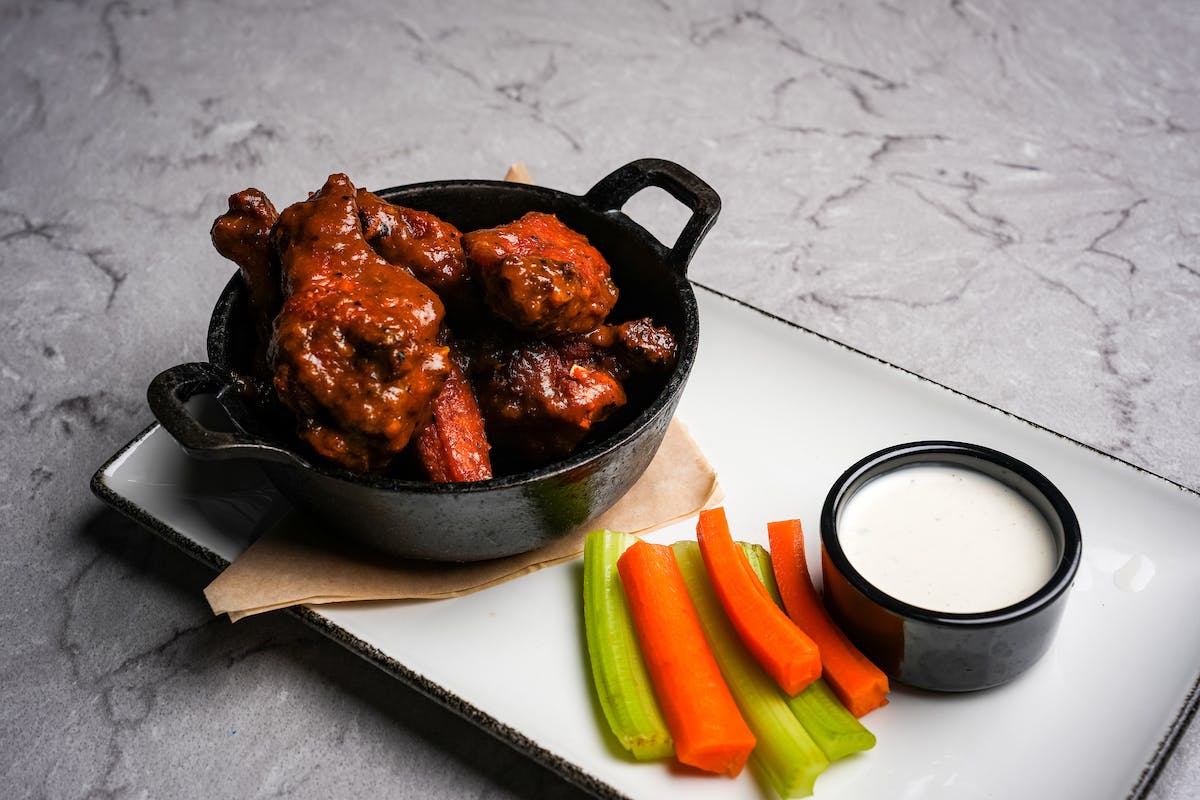 a bowl of food sitting on a table