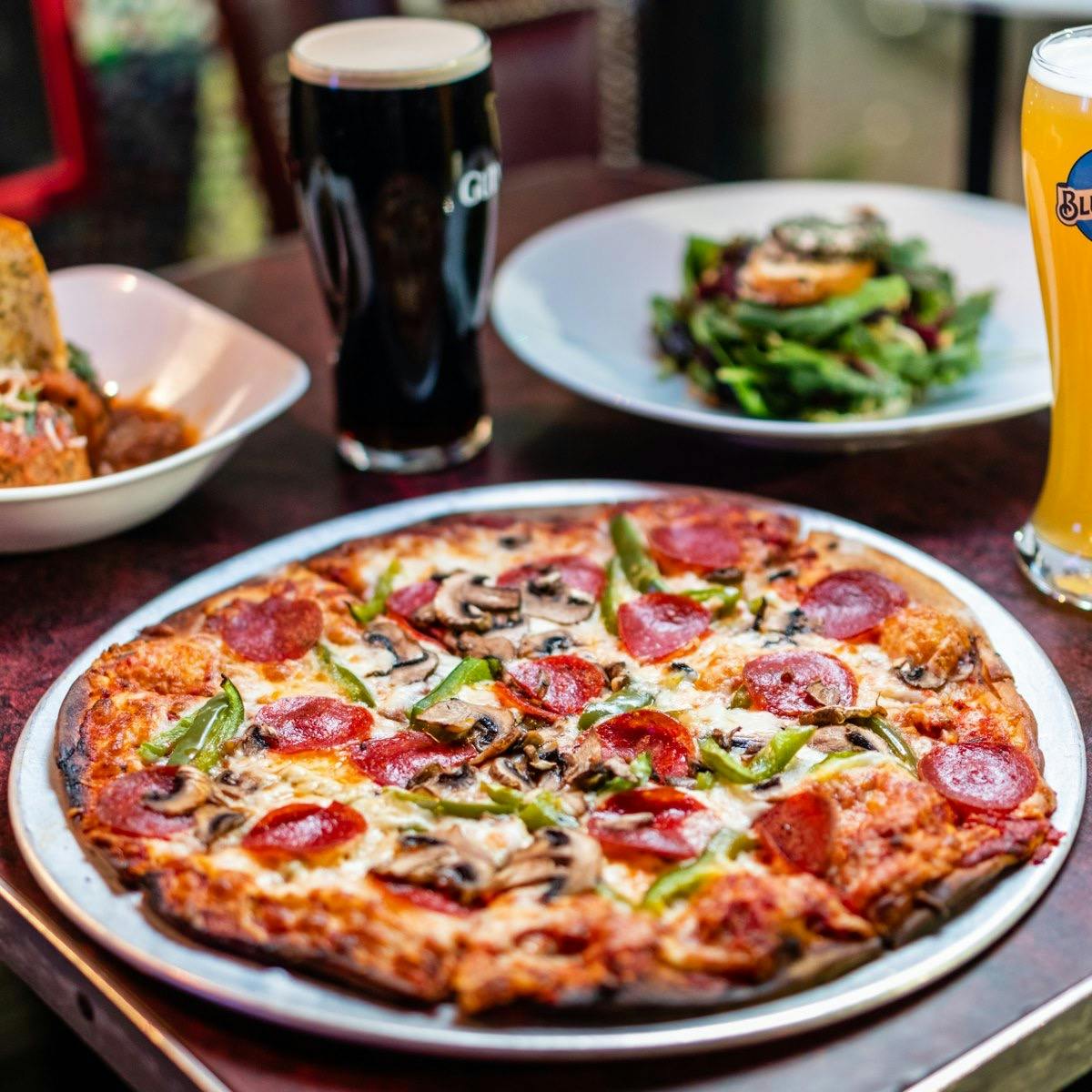 a pizza sitting on top of a table